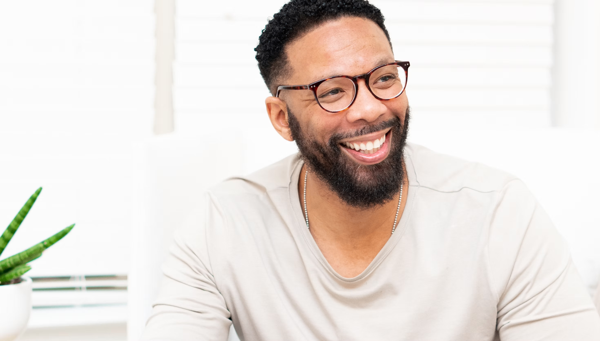 Sharif, LifeCoachATL — laughing during a coaching session
